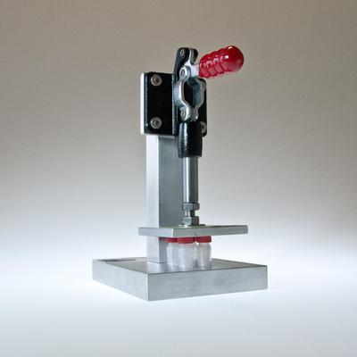 Toggle Press